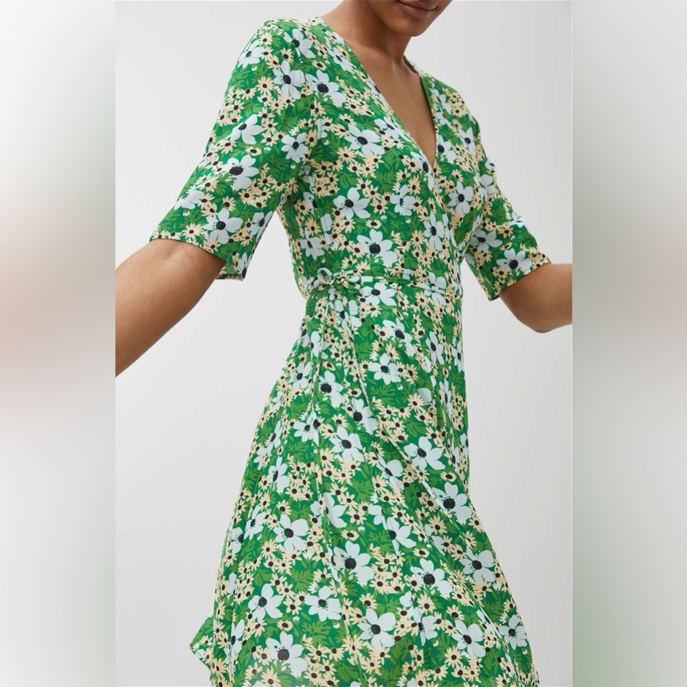 Green patterned Arket wrap dress.